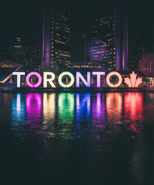 Find Toronto Translation Services at 5 Stars Translation, with the view of the Toronto sign in Nathan Phillips Square